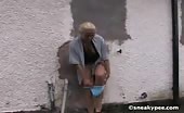Busty blonde peeing outdoor