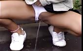 Petite girl caught peeing in public