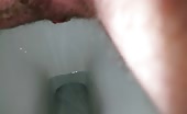 Hairy guy shitting in toilet