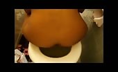 Sexy babe shitting in toilet