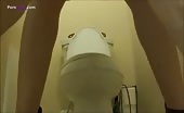 Sweet girl shits over toilet