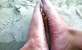 Sand and poop on his sexy feet