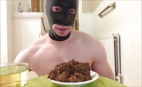 Dinner is served for masked teen boy