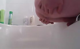 Amazing turd in the bathtub