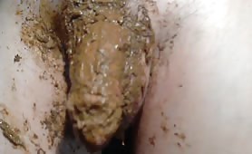 Erect cock with brown poop