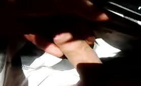 Rubbing a hard turd on tip of his penis