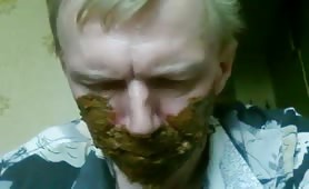Slave eating and smearing poop on his face