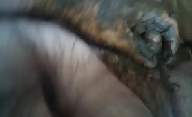 Hairy guy rubbing creamy shit on his long cock