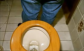 Mature gay guy shitting in the toilet for his fans