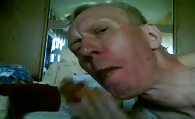 Skinny guy eating a fresh brown turd