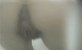 Sexy teen in public bathroom shitting