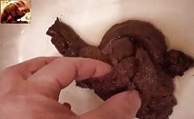 Mature gay guy playing with a huge turd