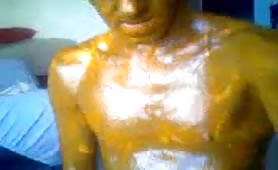 Rubbing yellow shit on his entire body