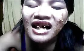 Smearing shit on her face for the first time
