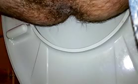 Hairy guy shitting
