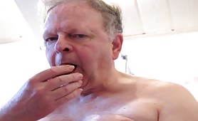 Old man eating shit