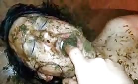 very messy scat girl gets shit stuffed in her pussy