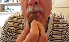 Old man eating hard poop