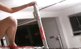 Sexy blonde pissing in the scaffoldng