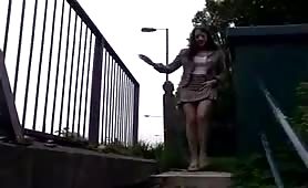 Girl pissing on the street