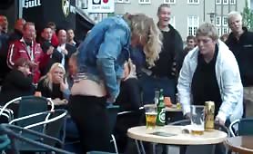 drunk woman takes a piss in public