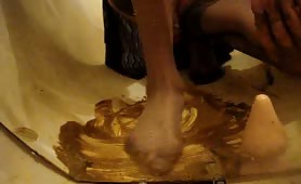 Rubbing the scat all over my bathtub and feet