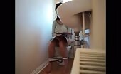 Sweet babe shits over toilet