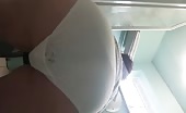 Chick in white sexy panty pooping in closeup