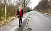 Young blonde babe pooping on the road 