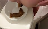 Sweet hot chick pooping in the toilet 