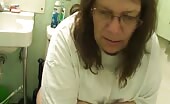 mature lady on glasses has a hard time pooping