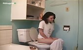 Girls pooping in the toilet