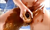 Dirty girl masturbating with a lot of shit  