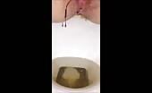 Yummy hot wife leaking shit in the toilet 